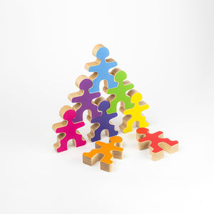 Flockmen stacked in a pyramid with the rainbow personalisation stickers