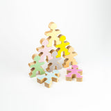Flockmen stacked in a pyramid with the pastel personalisation stickers