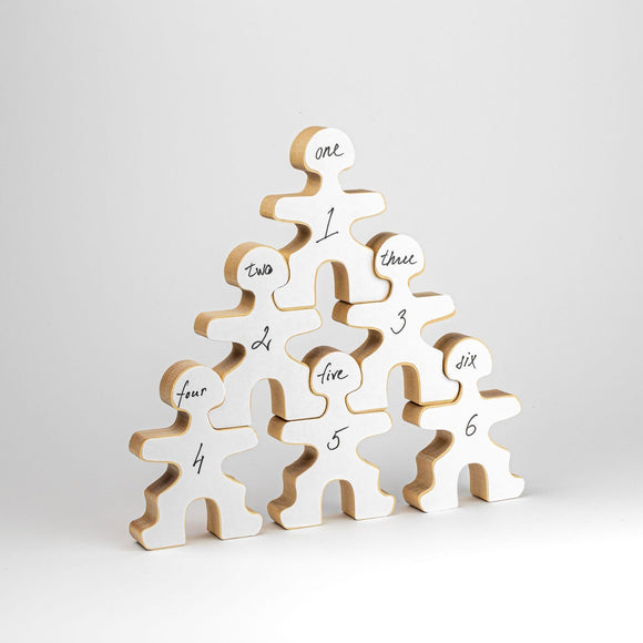 Flockmen stacked in a pyramid with the creative personalisation stickers