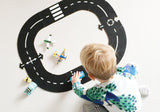 Children playing with Waytoplay Ringroad flexible road and cars